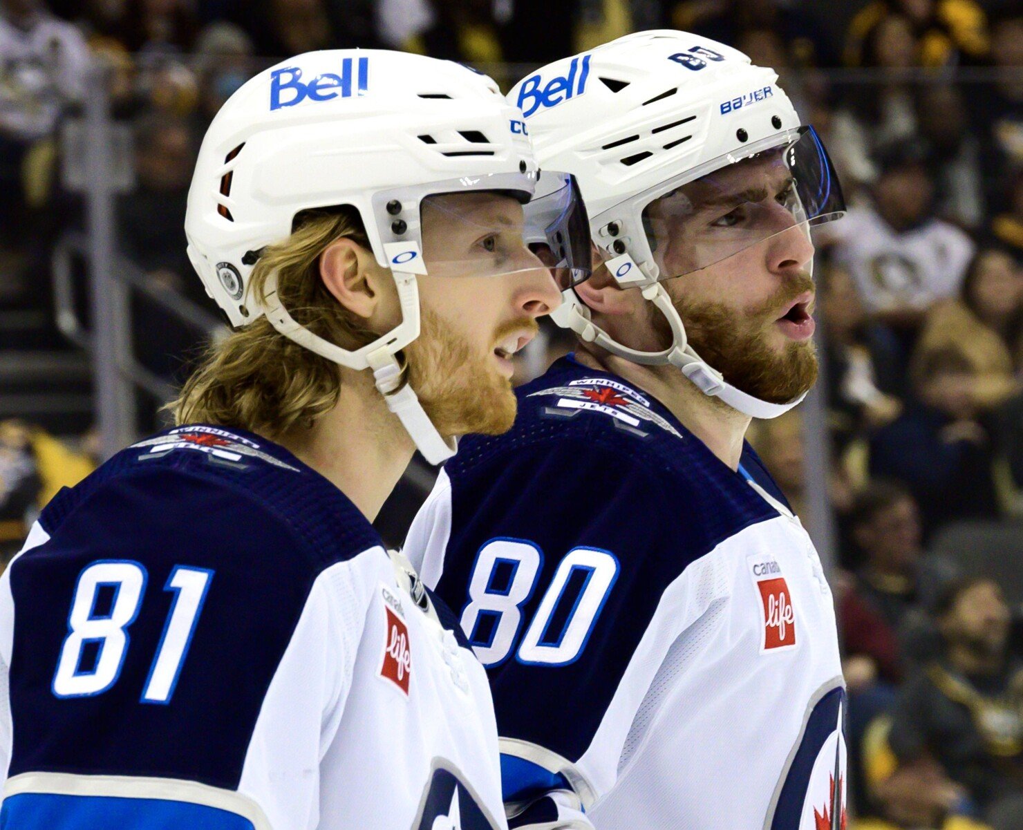 Pierre-Luc Dubois (80) a Kyle Connor (81)