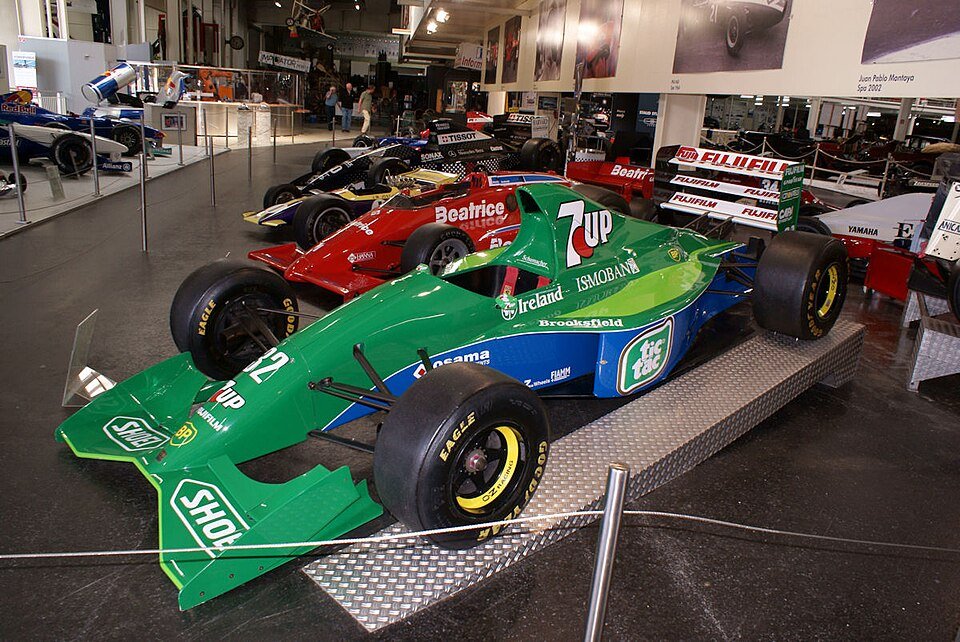 Jordan_191_1991_Formula1_Racer_Michael_Schumacher_Jordan_7UP_Racing_LSideFront_SATM_05June2013_(14414042570) Jordan_191_1991_Formula1_Racer_Michael_Schumacher_Jordan_7UP_Racing_LSideFront_SATM_05June2013_(14414042570)
